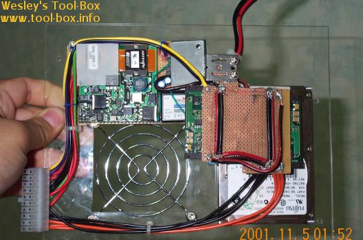 The power supply is attached to the cover of the system